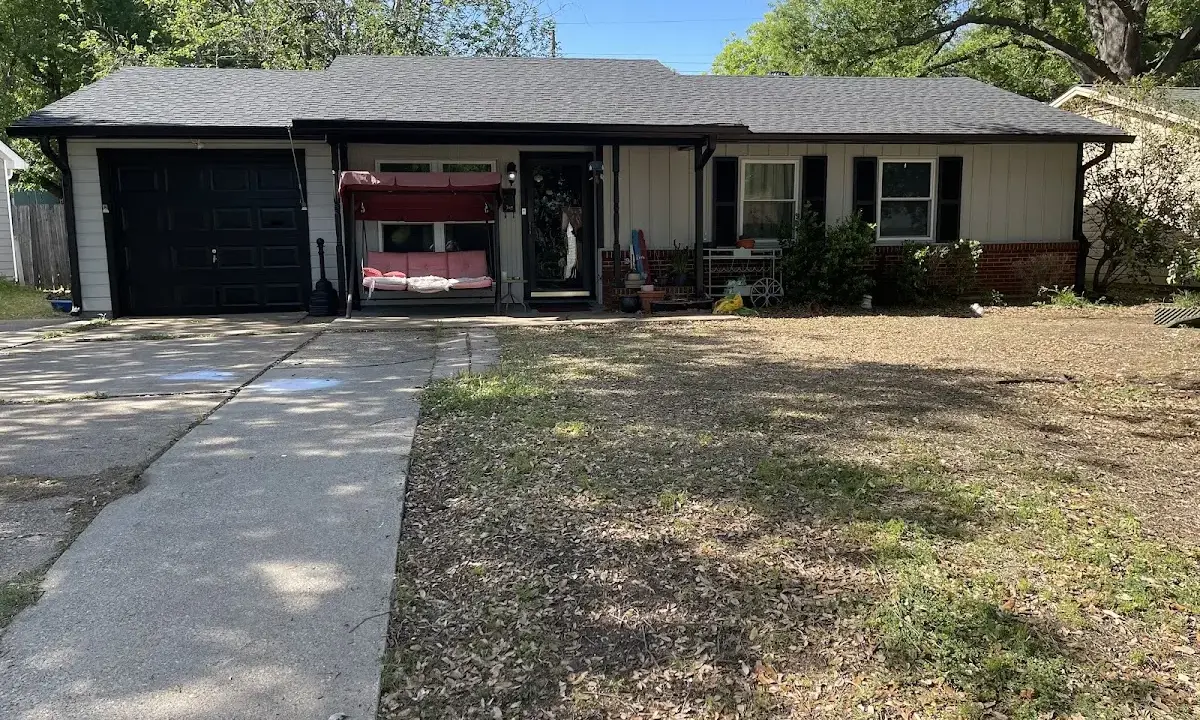 Asphalt Shingle Roof Repair crew at work on a residential roof in Cypress Gardens